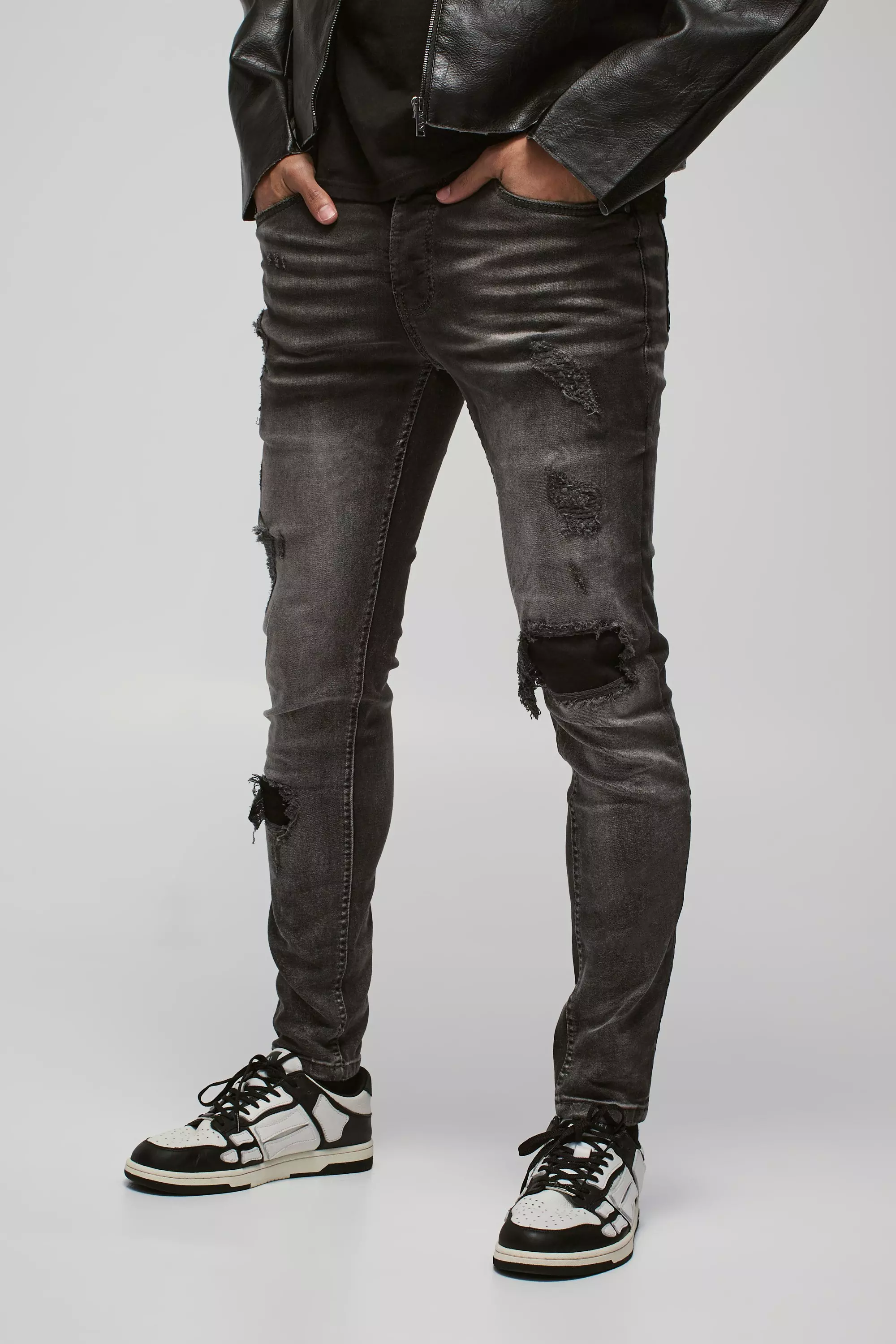 Dark grey best sale ripped jeans